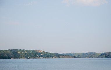 landscape meandering channel rocks canyons green vegetation