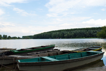 Naklejka na ściany i meble Several boats on the Riverside in Nature Reserve