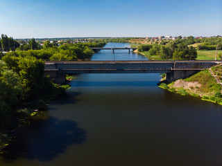Fototapeta premium Two bridges across river Matyra in Gryazi city in Russia