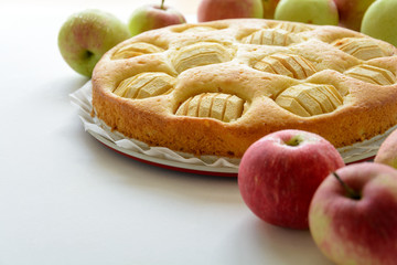 Homemade apple pie on gray wooden desk