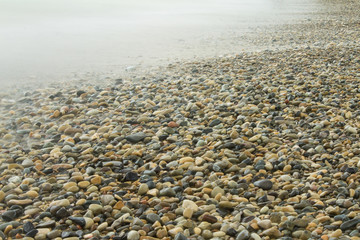 Obraz premium stones under water at long exposure