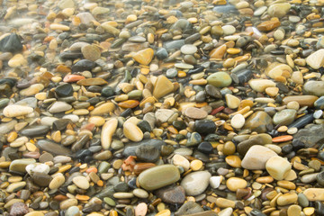 stones under water at long exposure