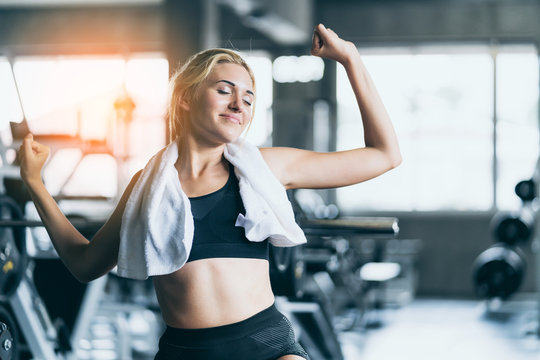 attractive caucasian woman relax after workout with happiness and joyful in gym healthy ideas concept