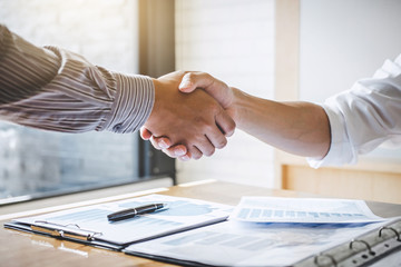 Successful of businessmen handshaking and business people after discussing good deal of trading contract, Business partnership meeting and greeting concept
