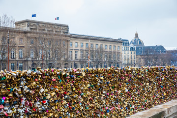 Naklejka premium Love locks at Pont Neuf and the city of Paris