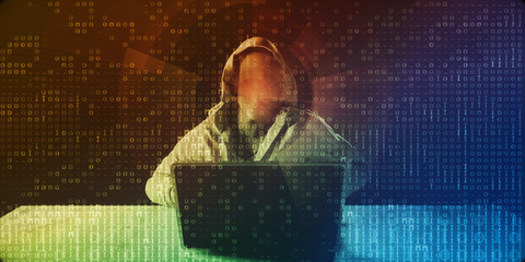 Hacker in Front of Computer