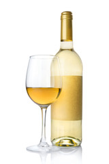 White wine bottle with empty label and glass for tasting