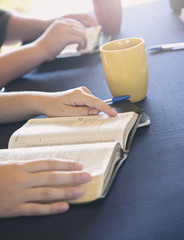 A Group of People Studying the Bible Outside