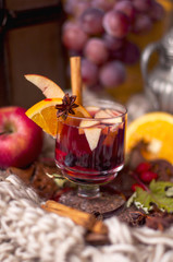Mulled wine with fruits and citrus, tasty winter drink
