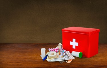 Fototapeta premium First aid kit with medical supplies