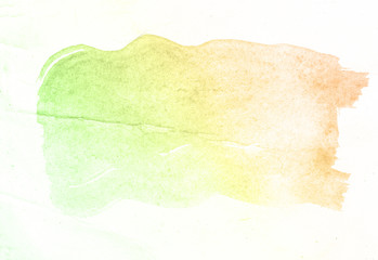 Yellow and green watercolor paint background.
