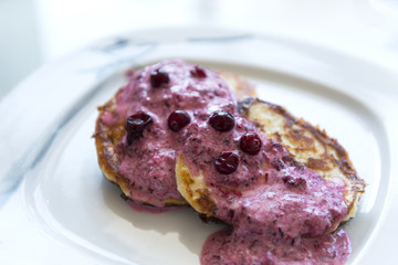 pancakes, pancakes with cranberry sauce on a plate