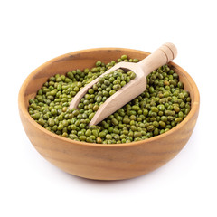 Raw mung bean or green bean in a wooden bowl isolated on white background