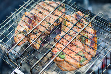 Barbecue steaks on the grill. Meat on the coals, barbecue close-up