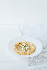 Colorful hummus bowls. Traditional hummus. Horizontal top view. Vegetarian dish.