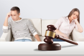 Young couple in lawyer office