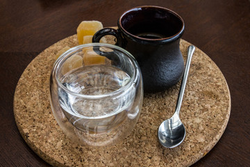 Coffee set, water glass, rahat lakoum and spoon. Traditional arabic table appointments