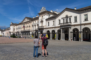 Obraz premium ITALY, AOSTA - JULY 8: Aosta is located region in the Italian Alps. View to the central square of. city in morning time on 8 July 2018 Aosta, Italy.