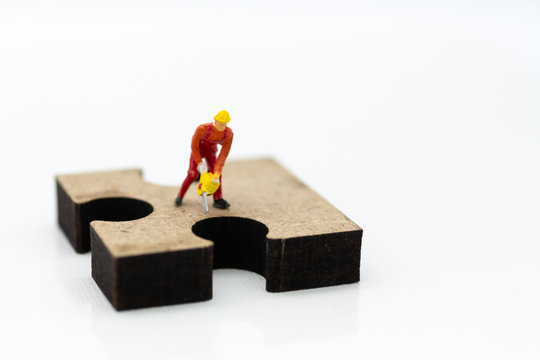Jigsaw puzzle piece on the jigsaw board, image use for solving problems, background concept.