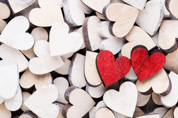 Obraz premium Background with wooden hearts, place for text.