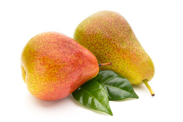 Fresh bio pear with leaves on isolated white background.