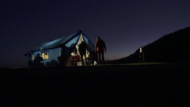 A night image of a cook tent in the Himalayas.