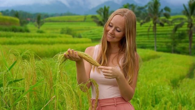 Young woman visiting the Jatiluwih Rice Terraces on the Bali Island