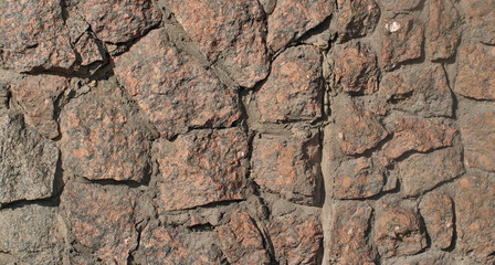 Granite faced wall.