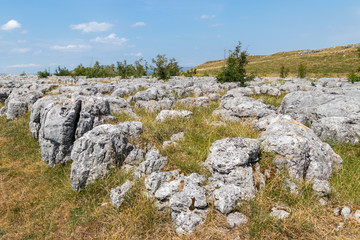 Fototapeta na wymiar View of the Limestone Pavement near the village of Conistone in the Yorkshire Dales National Park