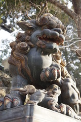 "Komainu" stone statue guardian of the shrine.