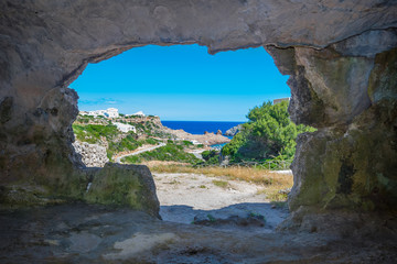 View From the Inside of Cala Morell Necropolis Caves - obrazy, fototapety, plakaty