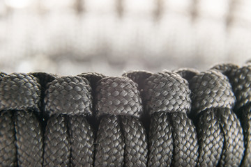 interlacing a black parachute bracelet