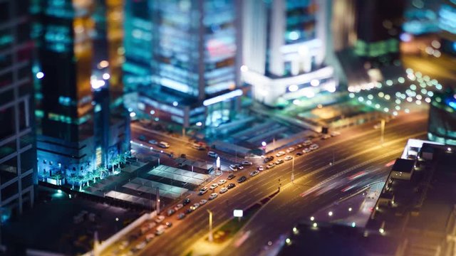 High angle view of traffic during the night in West Bay, Doha, Qatar. Miniature tilt-shift effect.