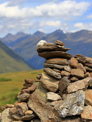 Cairn, man-made pile of stones, Oetztal Alps in Tyrol, Austria