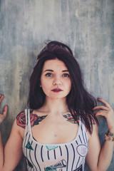 Young tattoo woman beauty portrait 