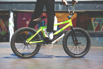 guy freestyler is riding a sports bike. retro toned