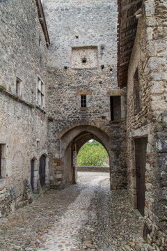 Arched Tunnel Through a Stone Wall in Perouges, France