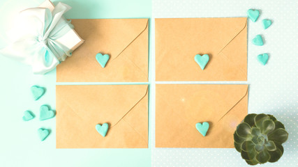 Blue gift box with jewelery and many small heart are all around. An envelope with love. The background is blue. The best gift for any holiday. Mock up. Free space for text. Succulent.