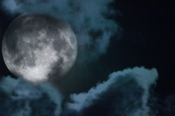 Naklejka na ściany i meble Halloween night sky with clouds and appearance of a full moon with craters close up