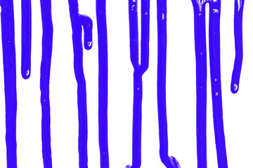 Flows of violet paint close-up on a white background