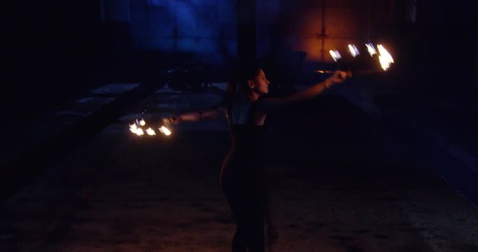 Female Fire Spinner Juggling Fire In Darkness Dangerous Skillful Low Light Slow Motion 8k Red Epic