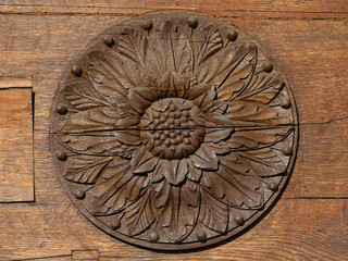 Decorative rosette on wooden door
