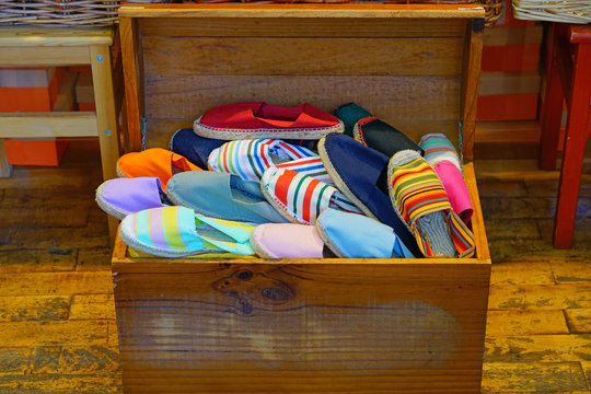 Display of colorful traditional espadrilles cord and fabric shoes in the Basque country, France