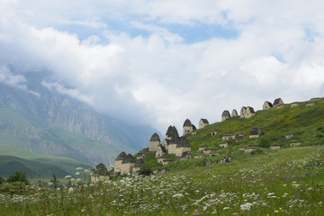 Dargavs. Republic of North Ossetia, Russia - 16 July 2017: City of the dead. Medieval necropolis.