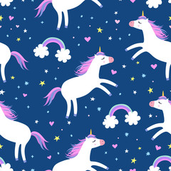 Cute cartoon colorful seamless pattern with unicorns rainbows and stars on blue sky background. Perfect for kids textile, wallpaper, wrapping paper etc. Vector illustration