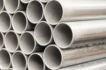 Close - up stack of metal pipe