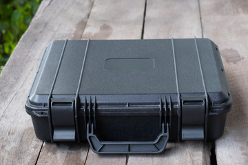 safety black case on wood