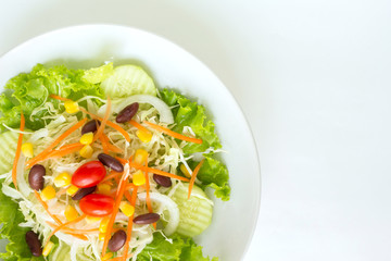 green salad plate fresh vegetable border on white background