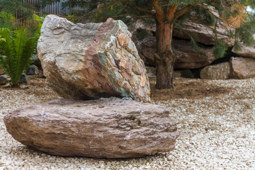 A group of decorative stones on pebbles.