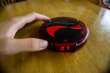 Fototapeta premium Buzzer Wireless Queue Calling for Restaurants or coffee cafe.